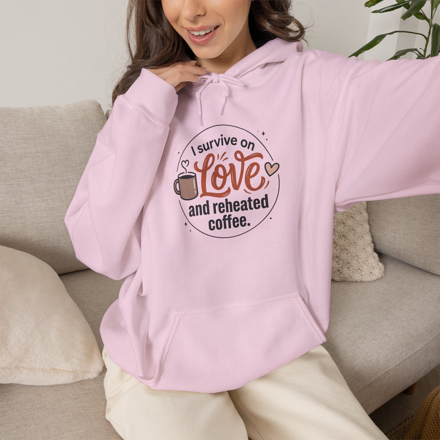I Survive on Love and Reheated Coffee Hoodie