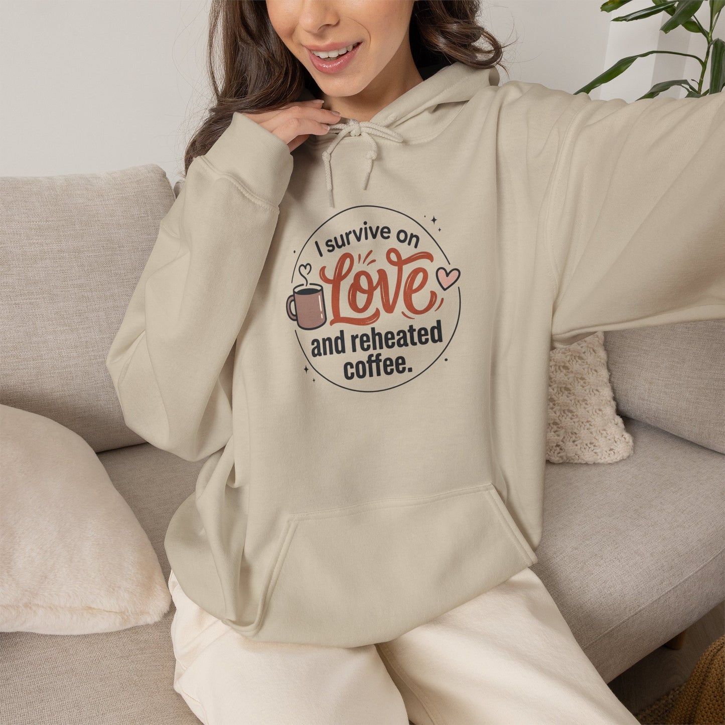 I Survive on Love and Reheated Coffee Hoodie