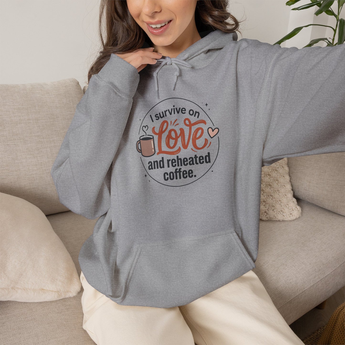 I Survive on Love and Reheated Coffee Hoodie